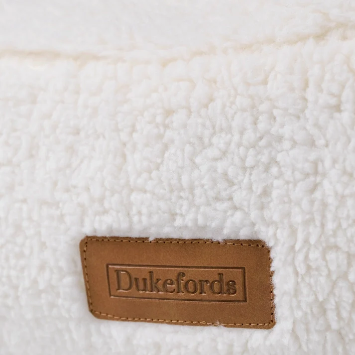 White Fleece Oval Bed | Luxe - Dukefords Dog Beds | Premium UK Pet Supplies